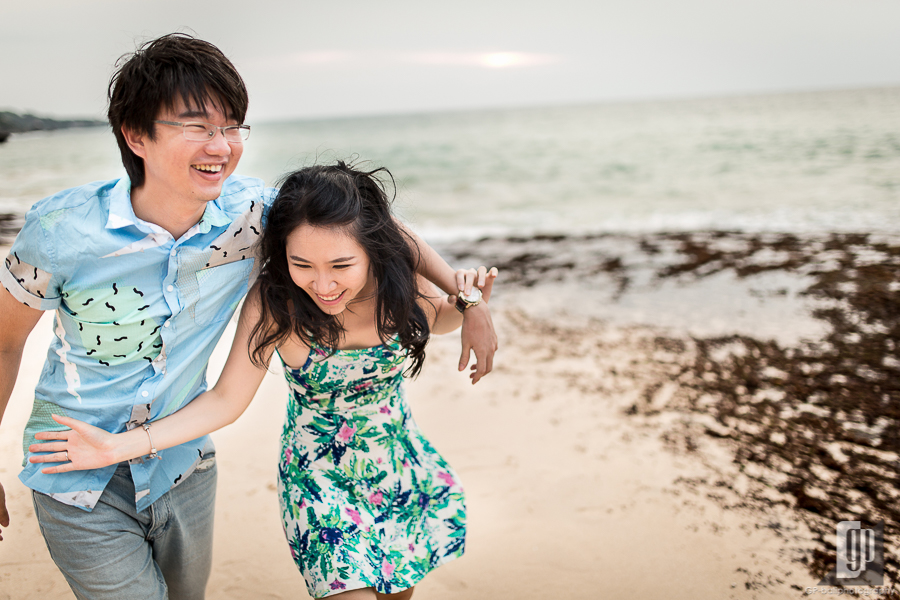 prewedding in tegal wangi beach bali love couple cave rock beach cliff sunset