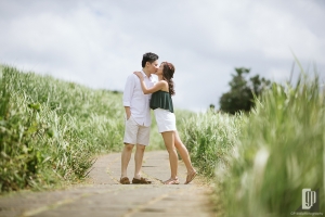 casual prewedding in ubud bali smile happy with love couple sun day light green grass