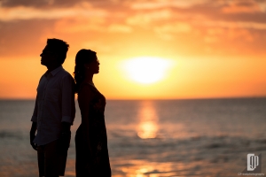 prewedding in tegal wangi beach bali smile happy with love couple majestic beautiful cave and cliff sunset