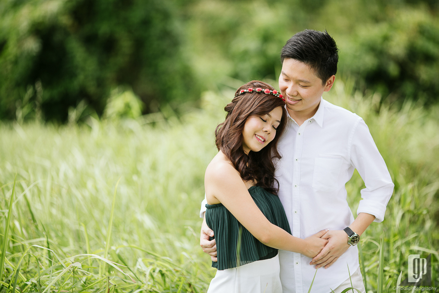 casual prewedding in ubud bali smile happy with love couple sun day light green grass