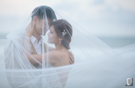 Prewedding in Tegal Wangi Beach Bali happy love smile happy sunset beach romantic hug kiss white dress and tuxedo veil