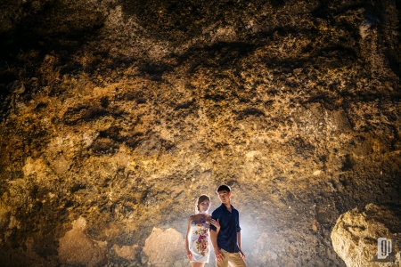 Prewedding in Waterfall Bali happy love smile happy sunset beach stone cliff casual romantic hug kiss